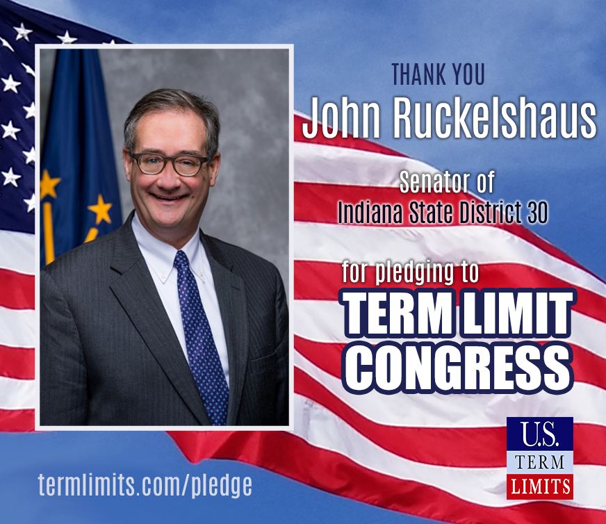 INS030Ruckelshaus-John signs term limits on Congress pledge