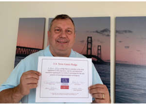 MI H018 Brian Hakola signs term limits on Congress pledge