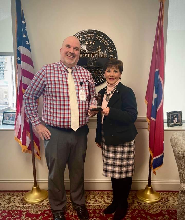 Rep. Michele Carringer Receives Plaque for Signing U.S. Term